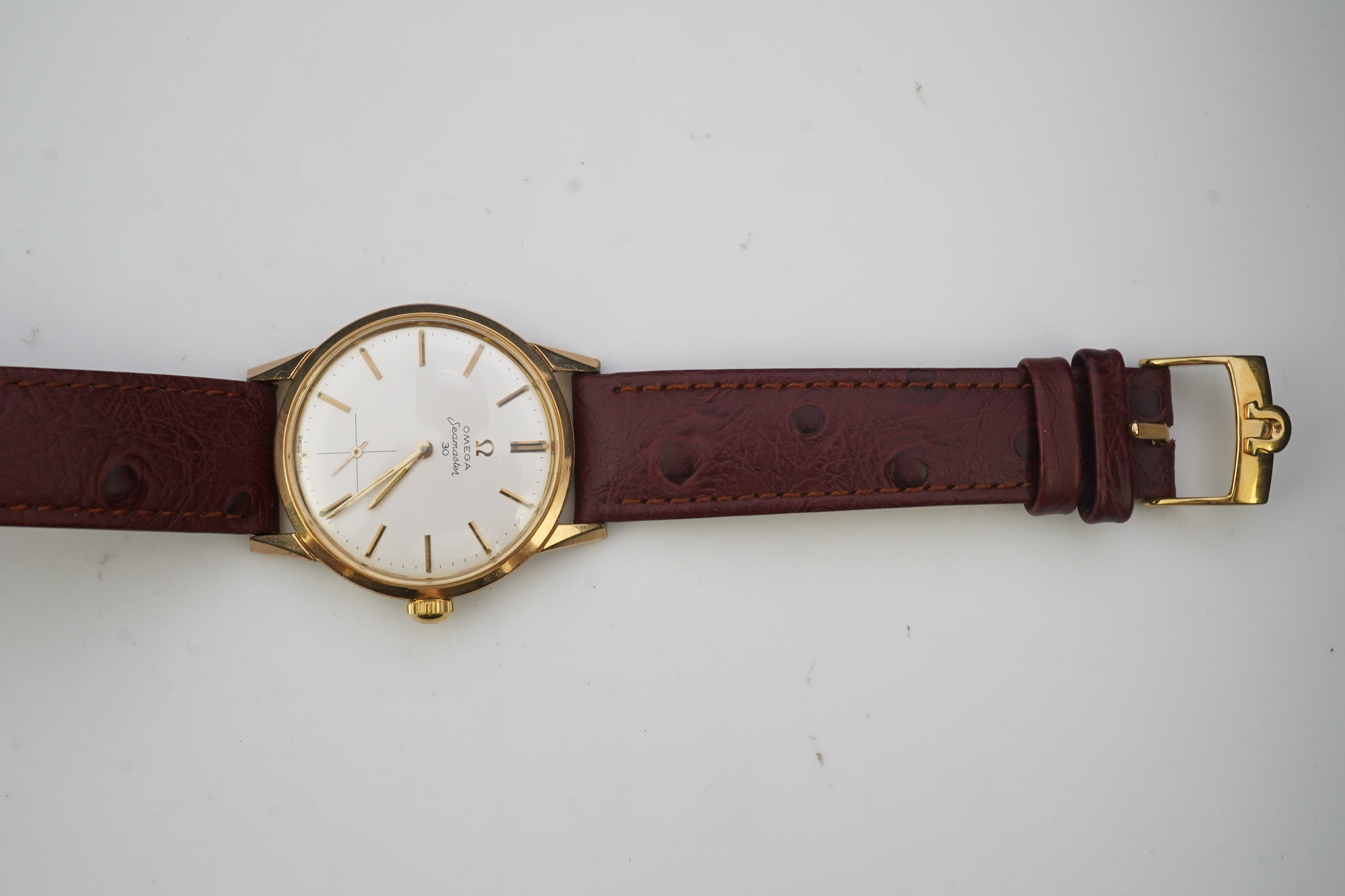 A gentleman's early 1960's steel and gold plated Omega Seamaster 30 manual wind wrist watch, on a later associated leather strap